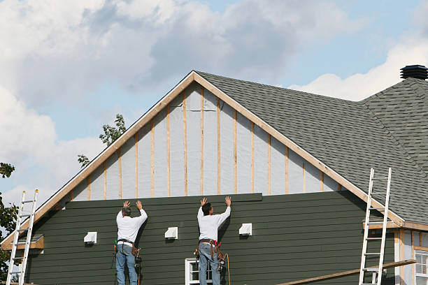 Professional Vinyl Siding technician working in Allston, MA